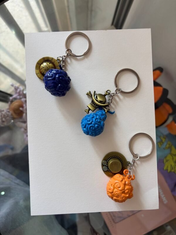 Gum-Gum Fruit Flame-Flame Fruit Op-Op Fruit One Piece keychain collectible set kaizoq anime merc, kaizoku realm anime store uganda