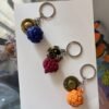 Gum-Gum Fruit, Flame-Flame Fruit, Op-Op Fruit key chains, i plan to set then as a variable product but all r on one photo product image