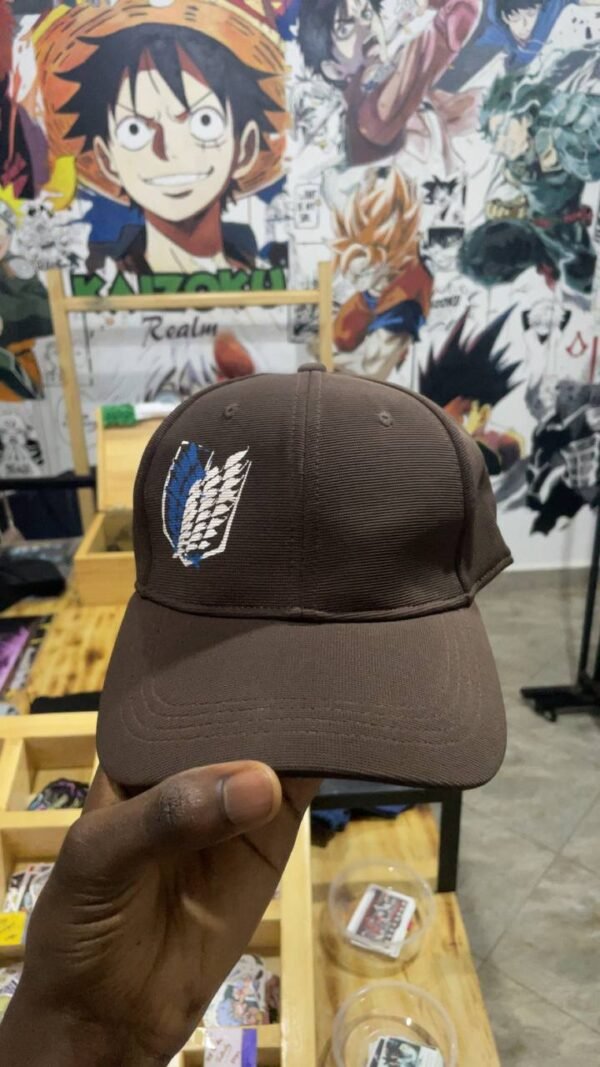 Caps (10) AOT Wings of Freedom Black Cap โ Premium Attack on Titan Anime Hat AOT Wings of Freedom Black Cap anime accessory kaizoq anime merc, kaizoku realm anime store uganda
