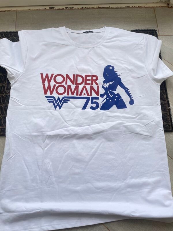 Premium Wonder Woman white t-shirt featuring a high-quality graphic of the Amazonian Warrior. Comfortable, stylish, and perfect for DC fans.