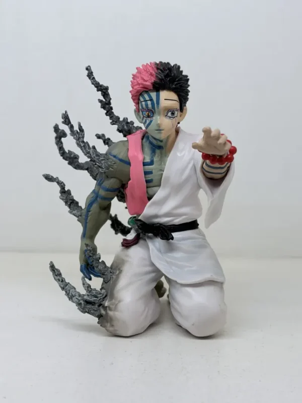 Figurines2 (45) Shop Akaza figurine from Demon Slayer Infinity Castle arc featuring emotional final moment design. High-detail anime collectible for fans and display.