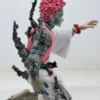 Figurines3 (60) Shop Akaza figurine from Demon Slayer Infinity Castle arc featuring emotional final moment design. High-detail anime collectible for fans and display.