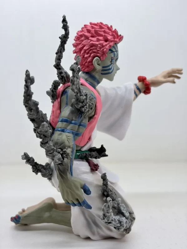 Figurines3 (60) Shop Akaza figurine from Demon Slayer Infinity Castle arc featuring emotional final moment design. High-detail anime collectible for fans and display.