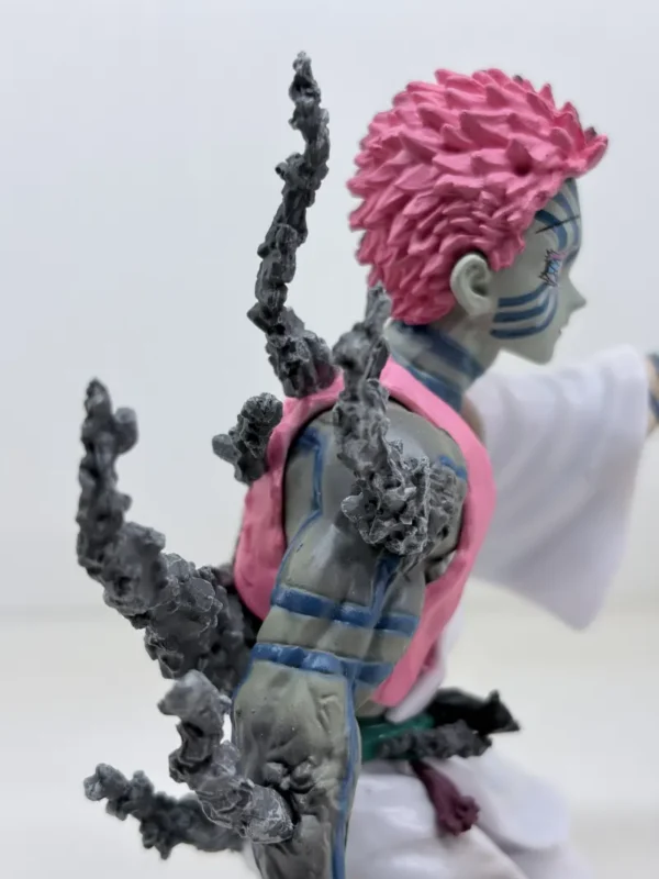 Figurines3 (61) Shop Akaza figurine from Demon Slayer Infinity Castle arc featuring emotional final moment design. High-detail anime collectible for fans and display.