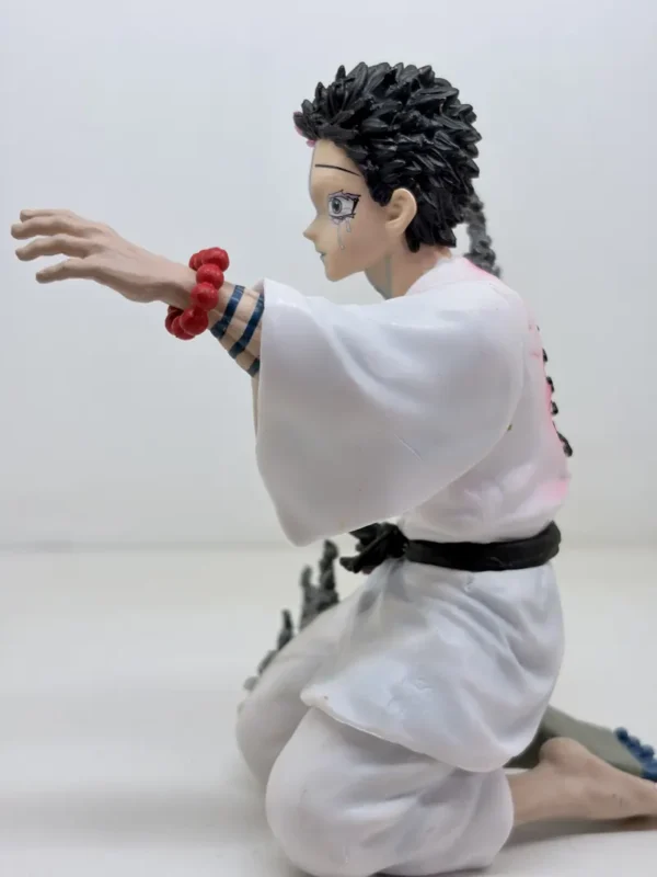 Figurines3 (62) Shop Akaza figurine from Demon Slayer Infinity Castle arc featuring emotional final moment design. High-detail anime collectible for fans and display.