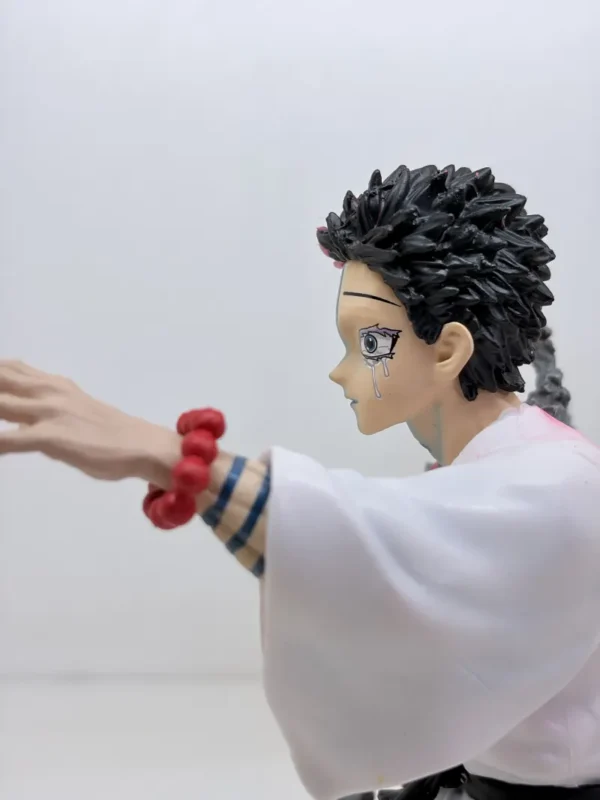 Figurines3 (66) Shop Akaza figurine from Demon Slayer Infinity Castle arc featuring emotional final moment design. High-detail anime collectible for fans and display.