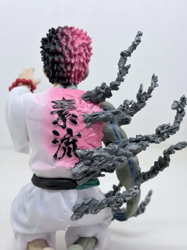 Figurines3 (67) Shop Akaza figurine from Demon Slayer Infinity Castle arc featuring emotional final moment design. High-detail anime collectible for fans and display.